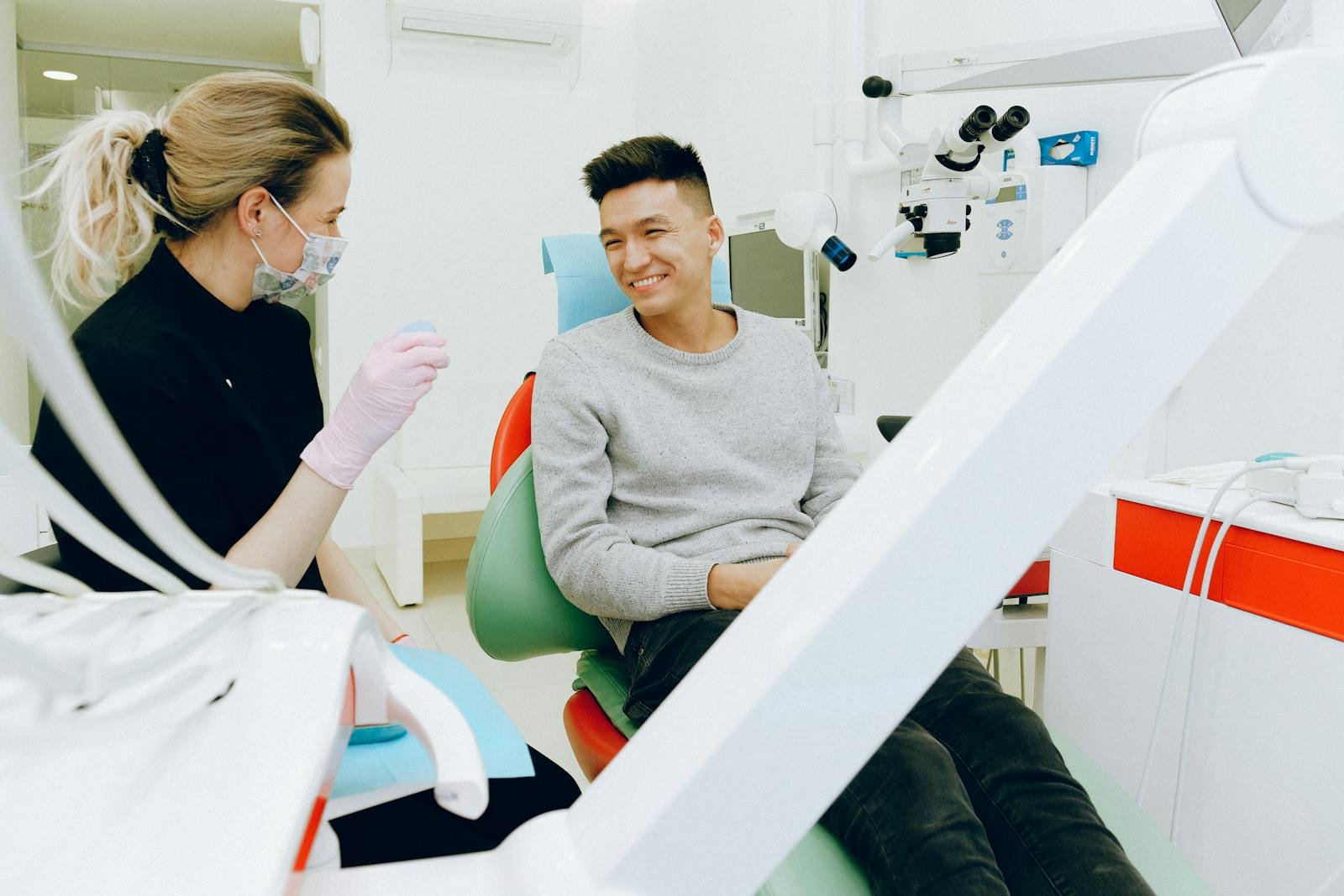 Dentist working with a patient in a modern clinic